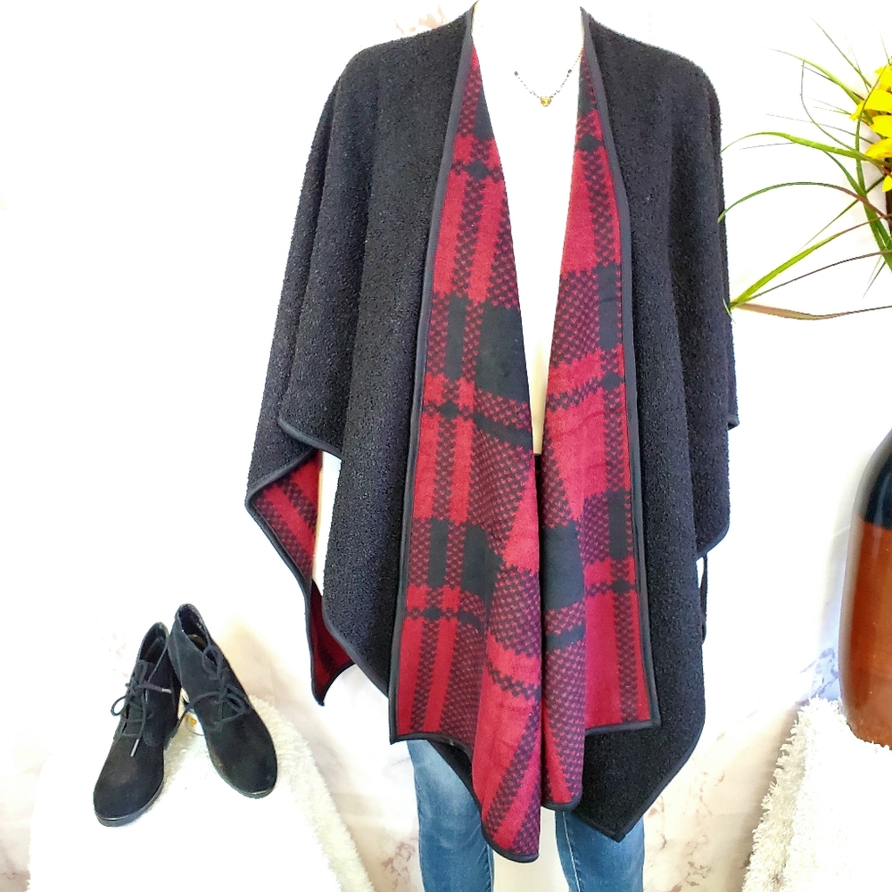NWOT. Beautiful, super plush and soft poncho.